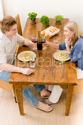 Dinner romantic couple enjoy wine eat pasta