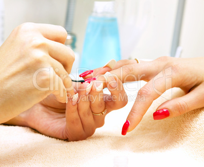 Manicure process... Female hands