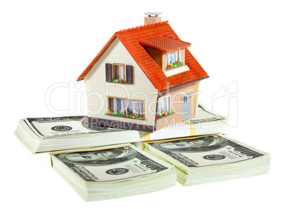 house on packs of banknotes