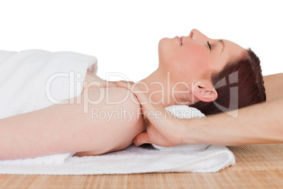 Closeup of a beautiful serene woman posing while relaxing in a s