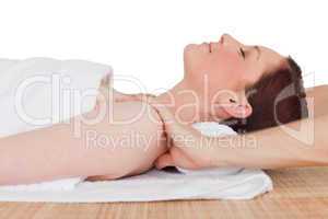 Closeup of a beautiful serene woman posing while relaxing in a s