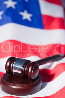 US flag and brown gavel