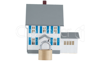 Secured gray house against a white background
