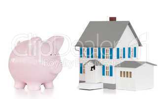 House and pink piggy bank