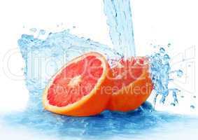 grapefruit in a spray of water
