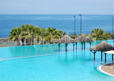 Swimming pool and beach of luxury hotel, Tenerife island, Spain