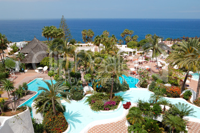 Recreation area with swimming pools and beach of luxury hotel, T