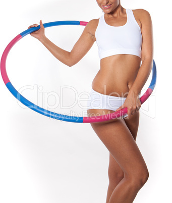 Woman holding hula hoop - Hula Hoop Exercises