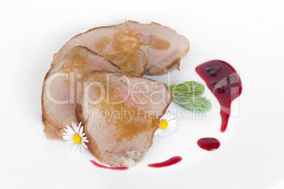 pork tenderloin with sauce and decoration