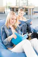 Young high-school student girls read books