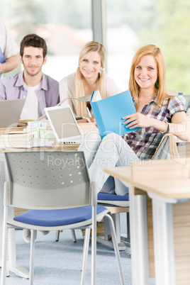 Group of young high school students learning