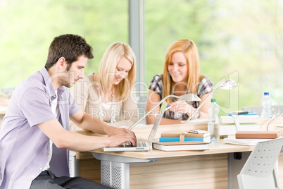 Group of young high school students learning