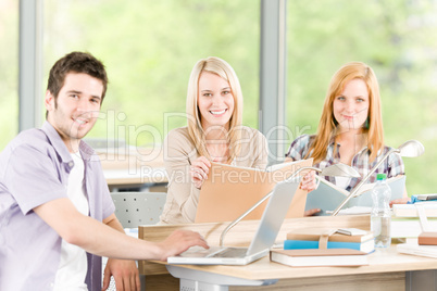 Group of young high school students learning