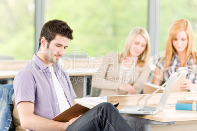 Group of young high school students learning