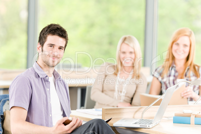 Group of young high school students learning