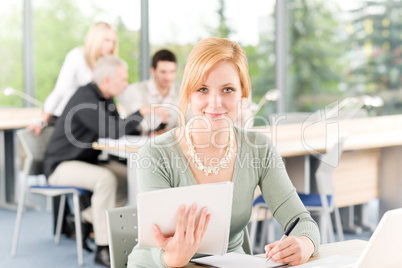 Young business students - businesswoman in front