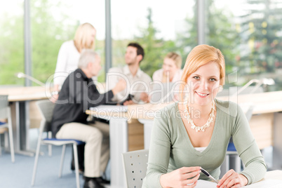 Young business students - businesswoman in front