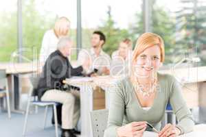 Young business students - businesswoman in front