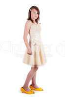 Teenager girl in mother's dress and shoes