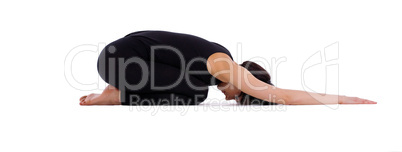 young woman doing yoga pose - child asana isolated