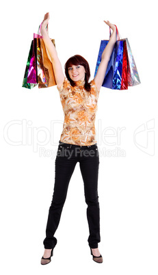 Beautiful happy woman with shopping bags