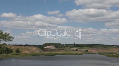 summer landscape with river and blue sky,