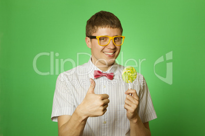 Young man with a lollipop