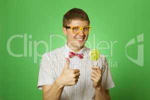 Young man with a lollipop