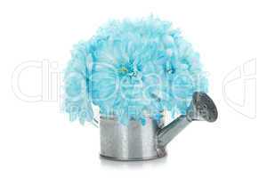 Watering can with blue flowers