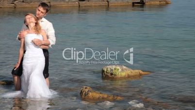 bride and groom on the beach