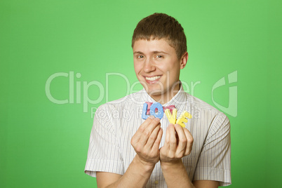 Close-up lover man holding the letter "love"