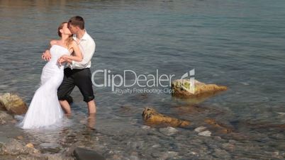 bride and groom on the beach