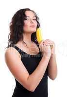 Woman with fruit gun look at camera