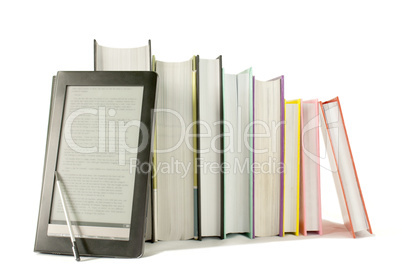 Row of printed books with electronic book reader on white background