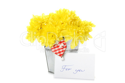 Yellow chrysanthemums in a pail