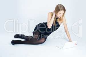 Attractive blonde girl with laptop