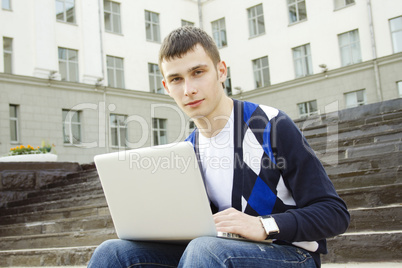 Young student working on a laptop