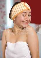 Woman wrapped in a bath towel