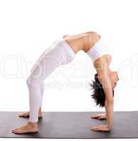 woman in yoga asana - bridge pose isolated