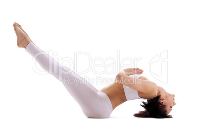 Young woman training yoga - fish pose in white