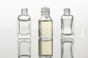 Glass flasks against a white background