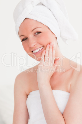 Good looking young woman  wearing towel