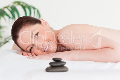 Happy young woman in a spa