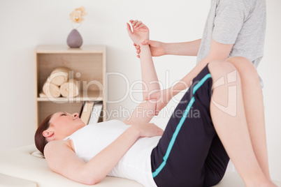 Young woman having an arm massage