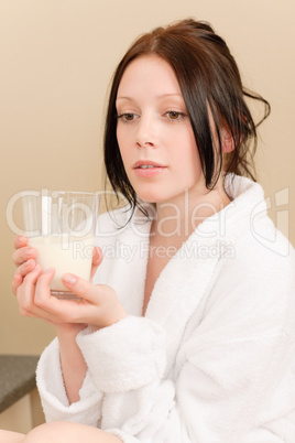 Young student girl drink milk for breakfast