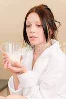 Young student girl drink milk for breakfast