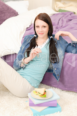 Young happy student relax have fresh sandwich