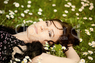 girl lying on a meadow