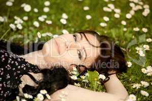 girl lying on a meadow