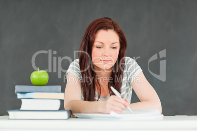 Young student taking notes